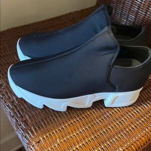 Iri shoes new size 7 lists $110 new black and whiter